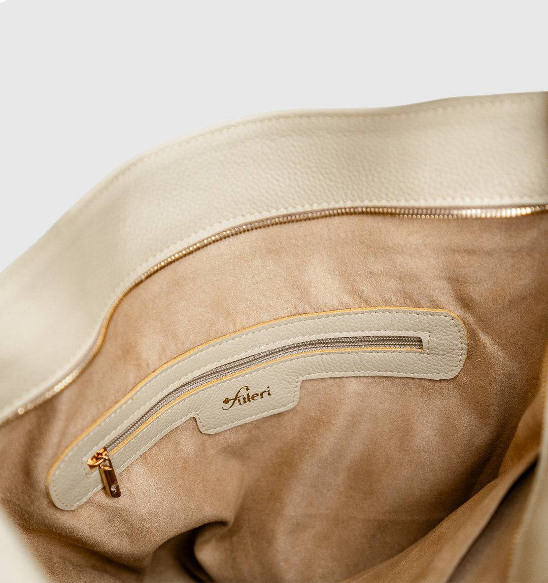 AMARA Convertible Leather Tote Beige, featuring a refined aesthetic with finest leather, secure zip closure, and hands-free versatility.