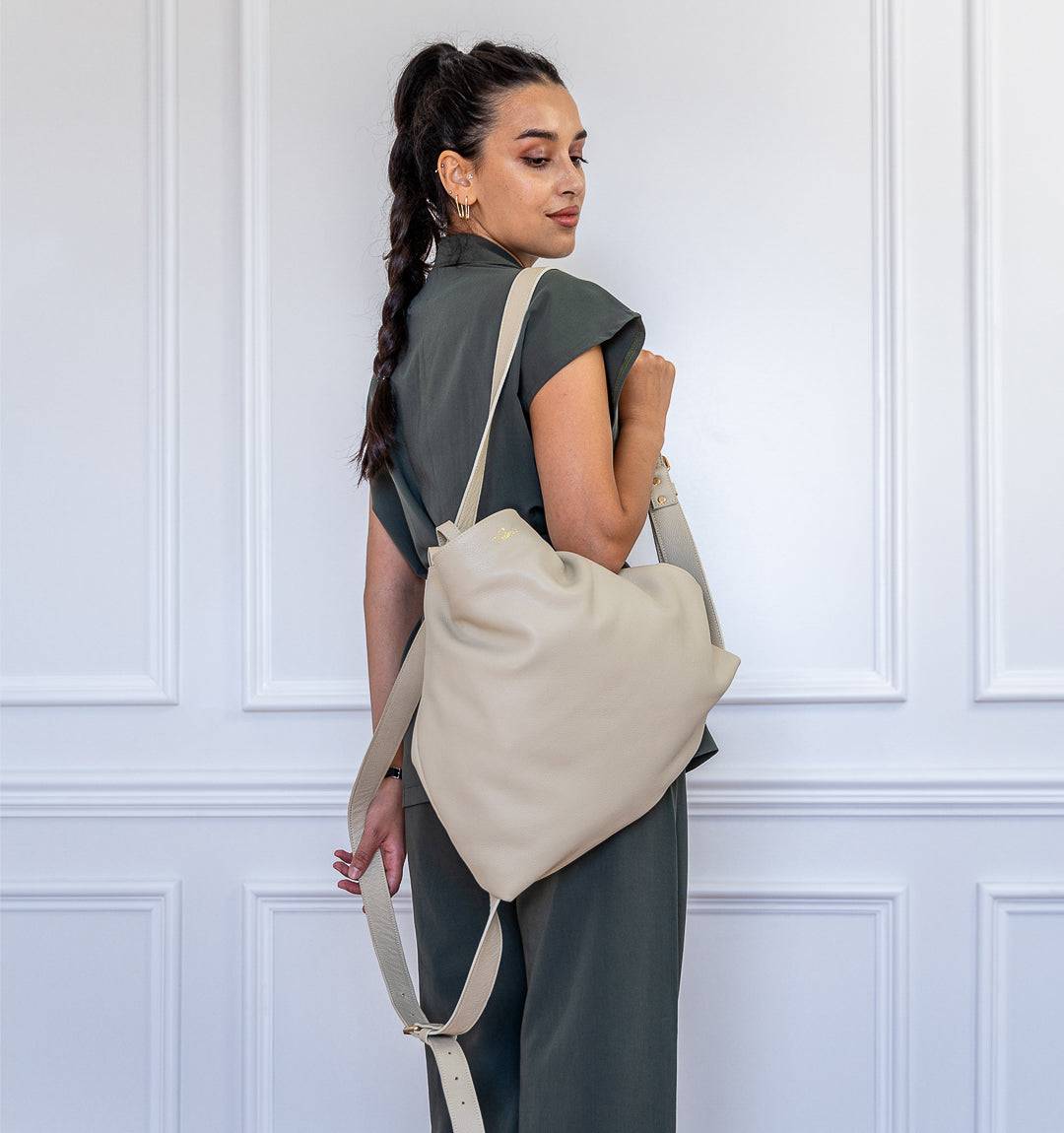 AMARA Convertible Leather Tote Beige, a versatile essential featuring a convertible design, finest leather craftsmanship, and a secure zipper.