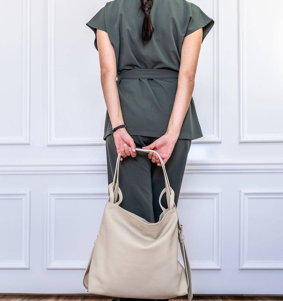 AMARA Convertible Leather Tote Beige, perfect for work or travel with a smooth zipper, adjustable straps, and premium leather material