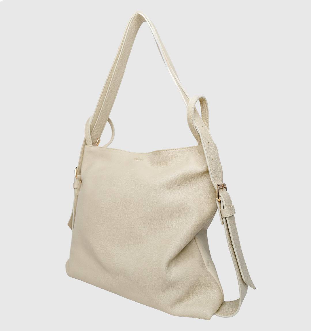 AMARA Convertible Leather Tote Beige, designed with the finest leather, a secure zipper, and adjustable straps for all-day comfort