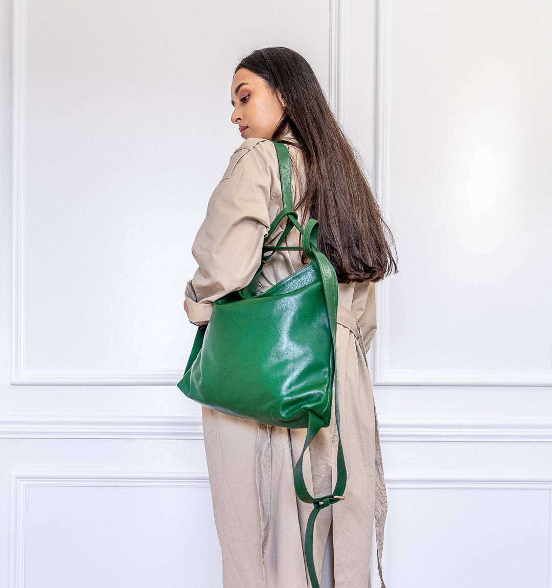 AMARA Convertible Leather Tote Green, designed for versatility with a tote-to-backpack function, adjustable straps, and a sleek, lightweight feel