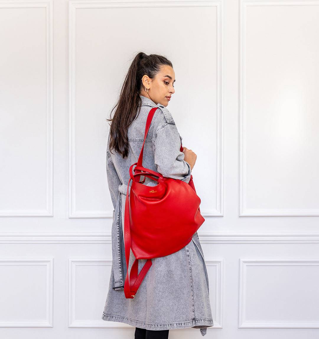 AMARA Convertible Leather Tote Bag Red, designed for hands-free versatility, featuring adjustable straps and premium soft leather.
