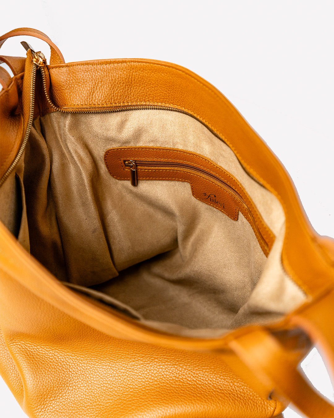 AMARA Convertible Leather Tote Tan, designed for effortless style with a structured interior, finest leather body, adjustable straps, and lightweight feel