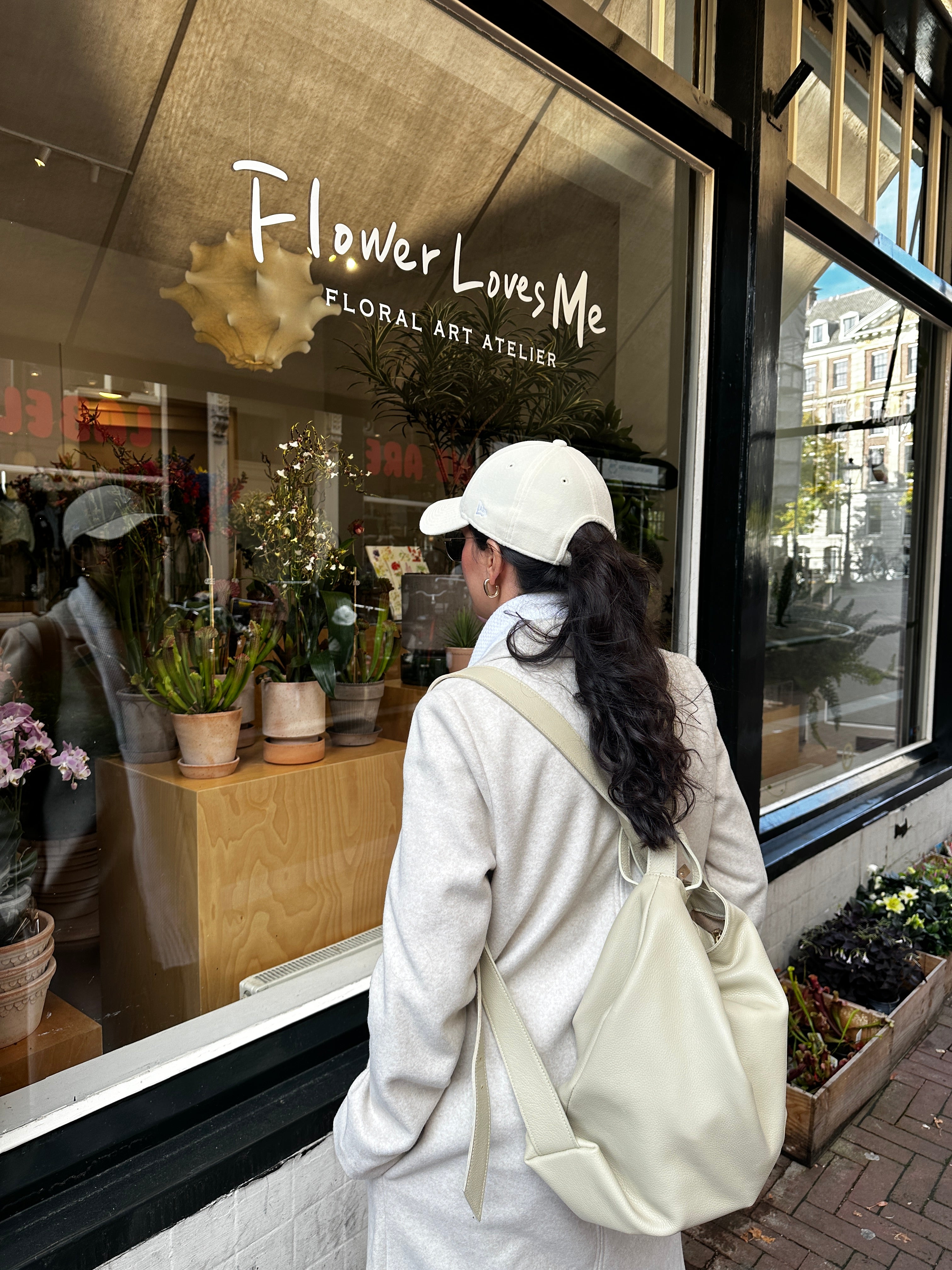 Amara leather tote bag lifestyle with convertible design and lightweight feel for everyday carry