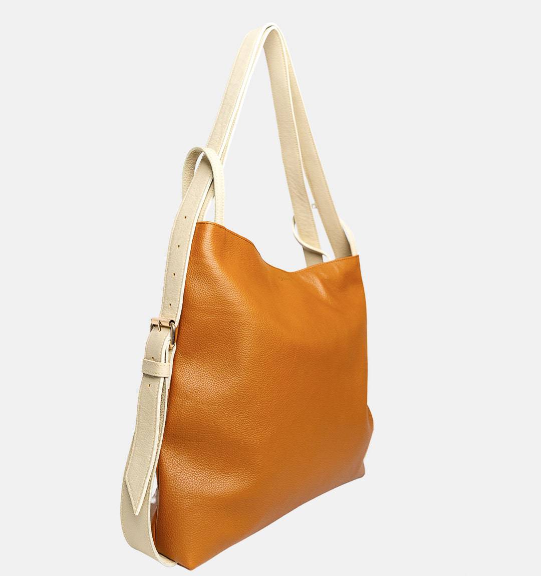 Side view of the FULERI Convertible AMARA Dual Tote Bag in Sandstone Tan, featuring premium leather and adjustable two-tone straps