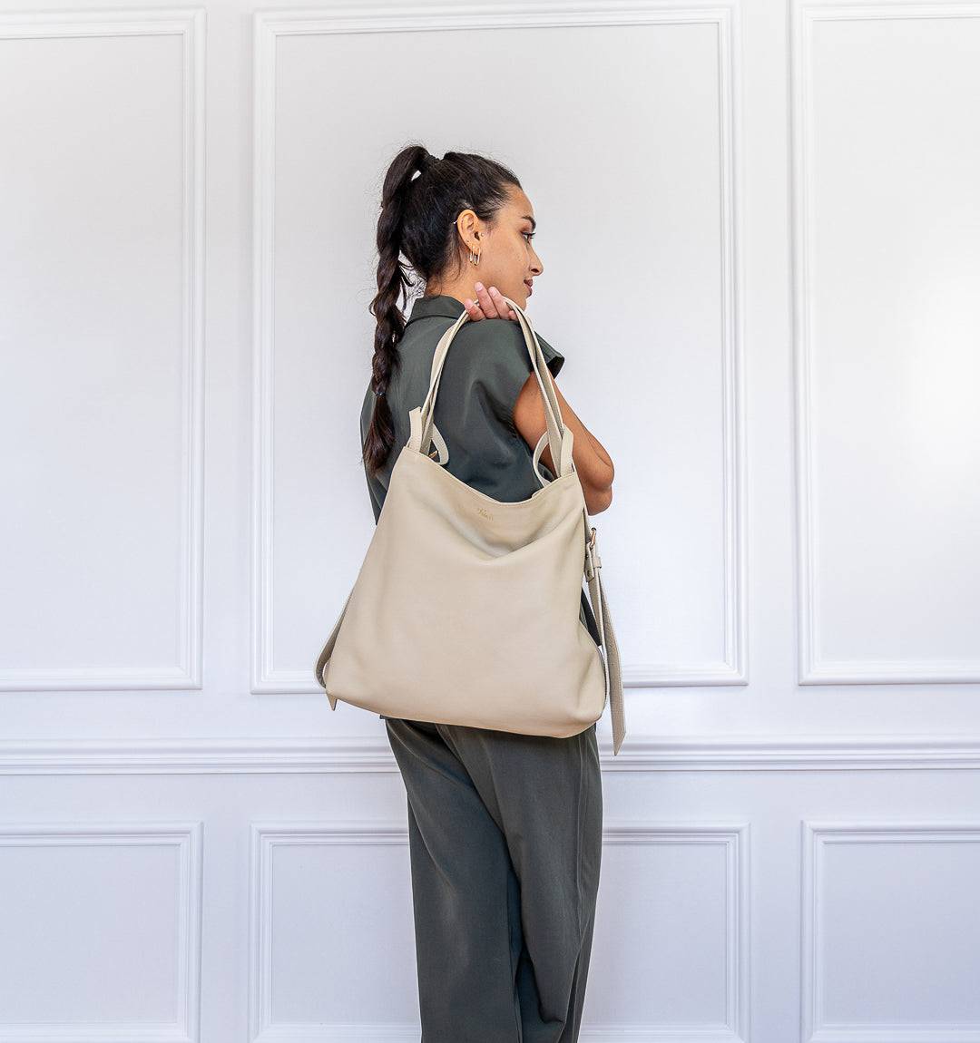 AMARA Convertible Leather Tote Beige, lightweight and spacious with a convertible function, top zipper for security, and soft leather