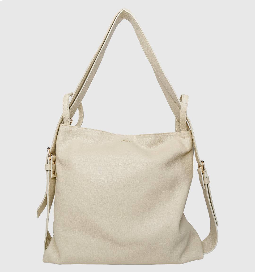AMARA Convertible Leather Tote Beige, the perfect fusion of luxury and function with finest leather, adjustable straps, and a smooth zipper.
