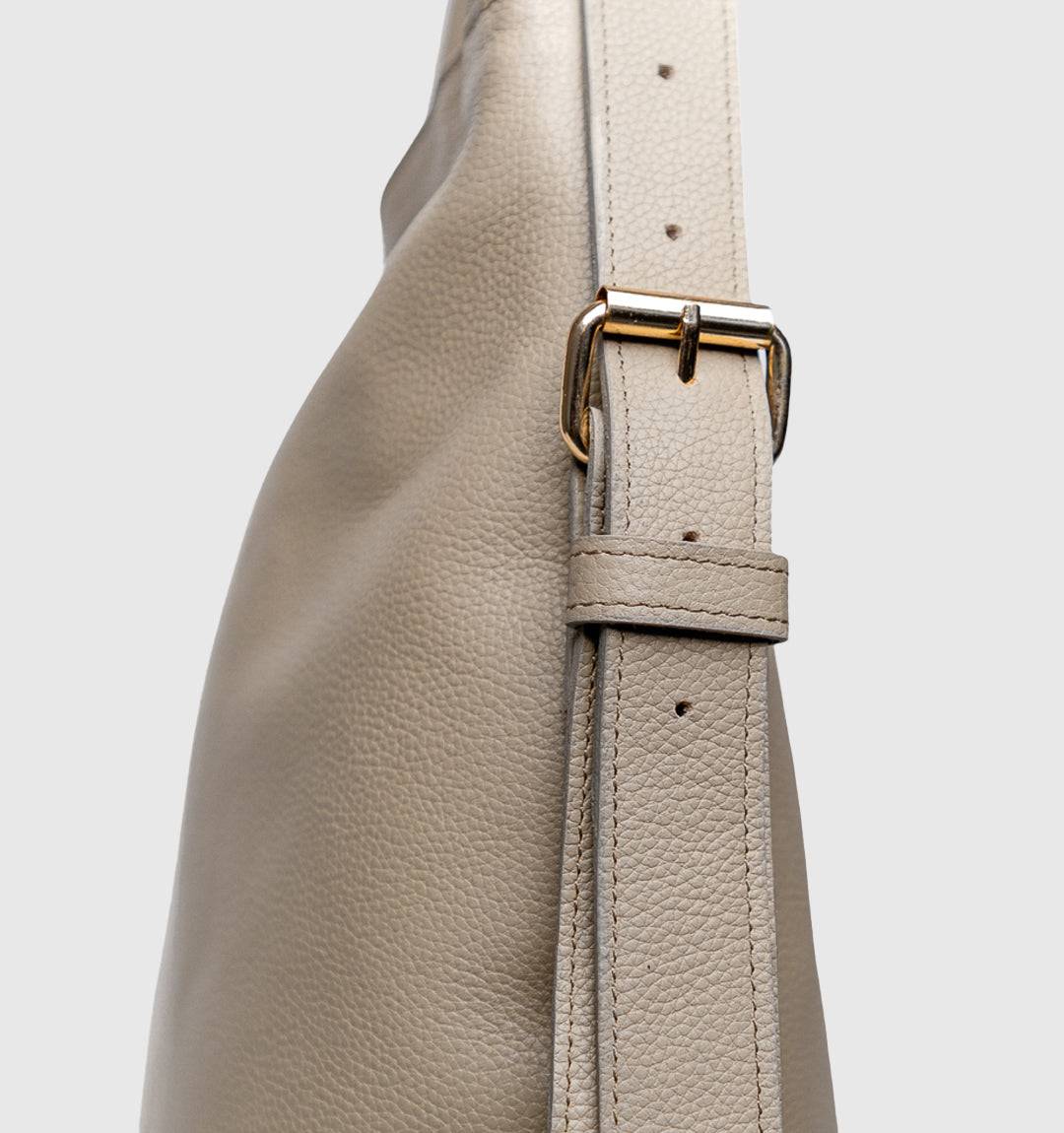 AMARA Convertible Leather Tote Grey, a stylish and functional tote-to-backpack design with adjustable straps and premium leather construction