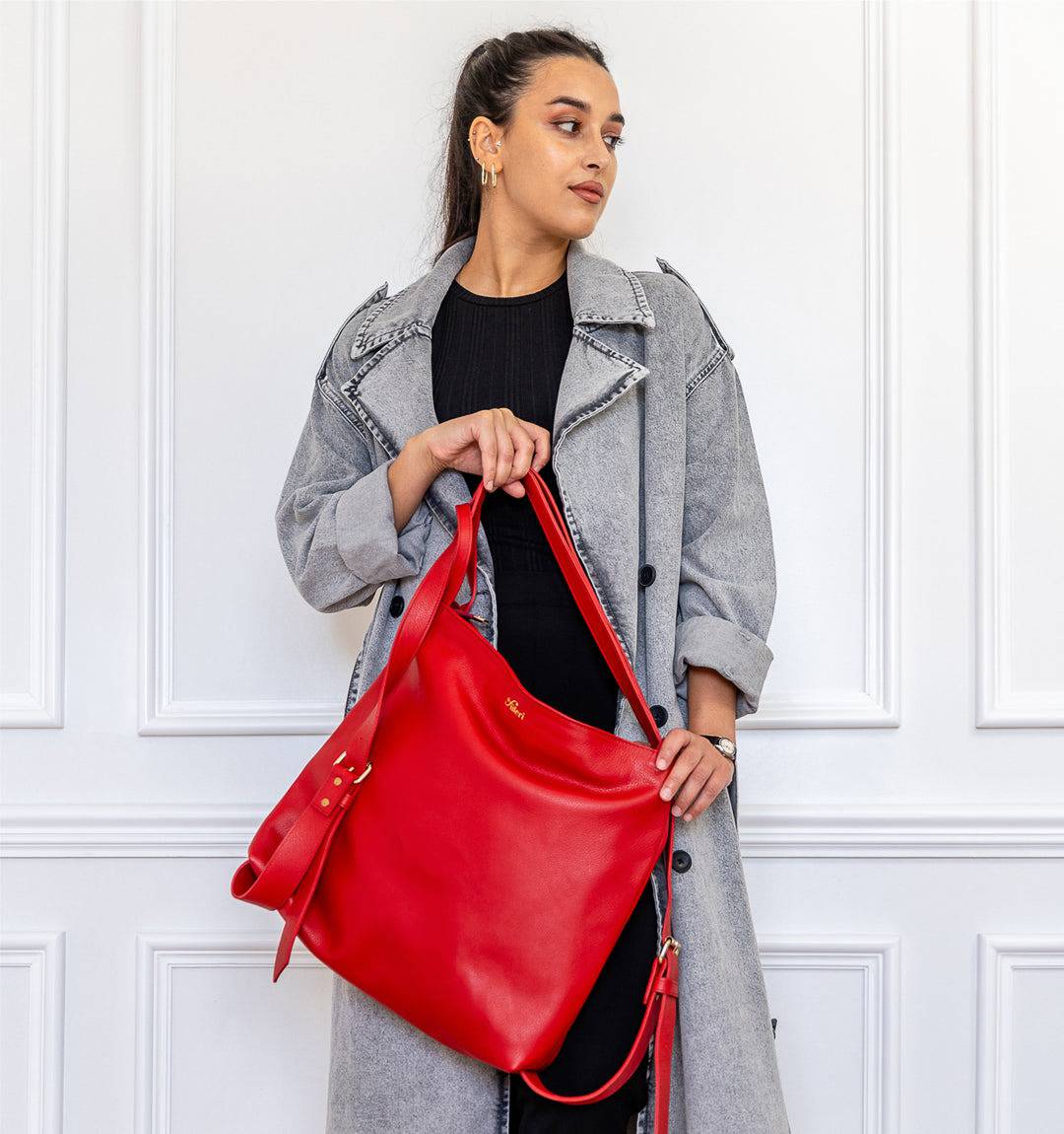 AMARA Convertible Leather Tote Bag Red, a modern statement piece with a structured silhouette, easy-access pockets, and convertible straps